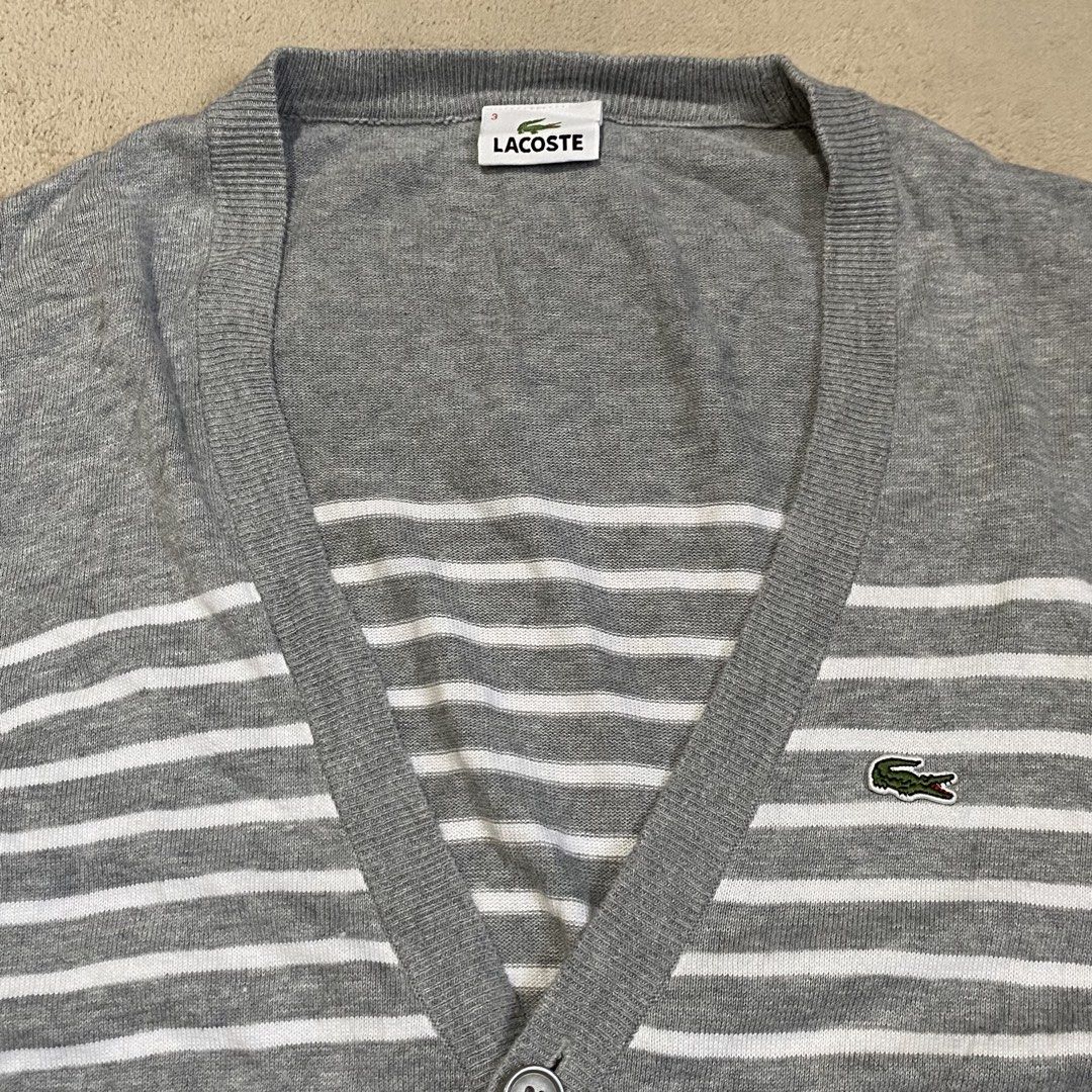 Lacoste V Neck Knit Cardigan (Category: Coats, Jackets and Outerwear) located in Polomolok. Submitted by larnel27 (Listing ID 1469052142, Image 2). Description: - Size medium (stretchable) - Dimension:19.5x26 - Hem 16 - Flawless.