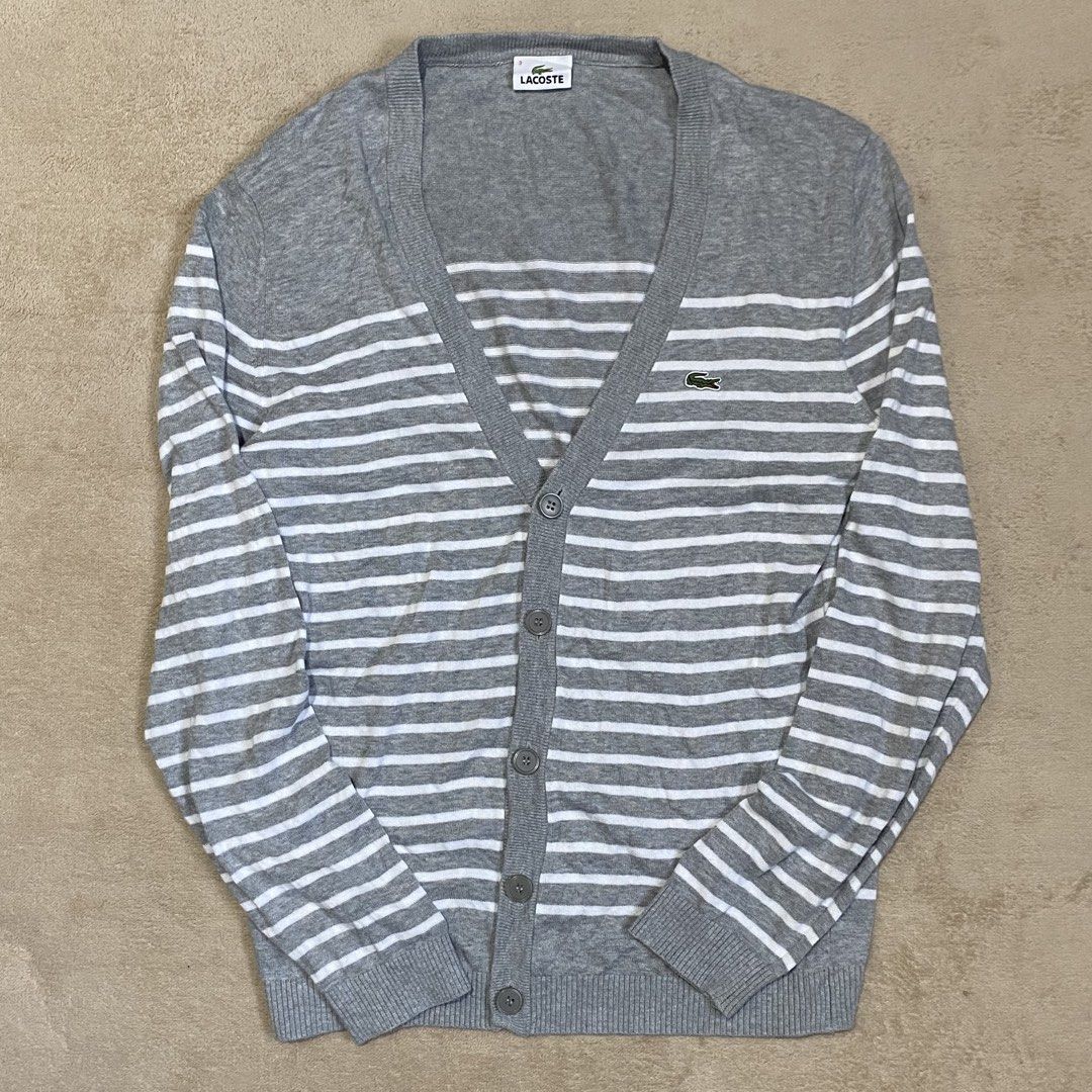 Lacoste V Neck Knit Cardigan (Category: Coats, Jackets and Outerwear) located in Polomolok. Submitted by larnel27 (Listing ID 1469052142, Image 1). Description: - Size medium (stretchable) - Dimension:19.5x26 - Hem 16 - Flawless.