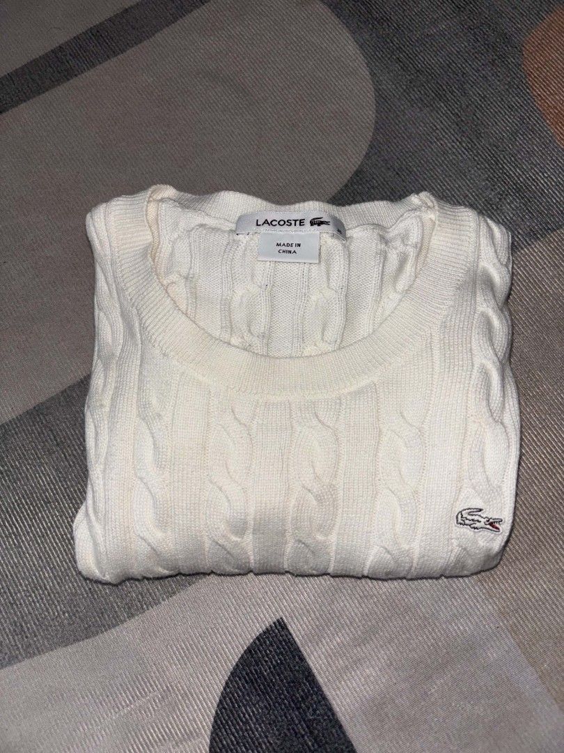 Lacoste White Cable Knit Sweater (Category: Longsleeves) located in Manila. Submitted by adriane.s_lootz (Listing ID 1468978254, Image 2). Description: Lacoste Cable knit Pristine condition No flaws Measurements Width 17 length 23 📍Nova Qc.