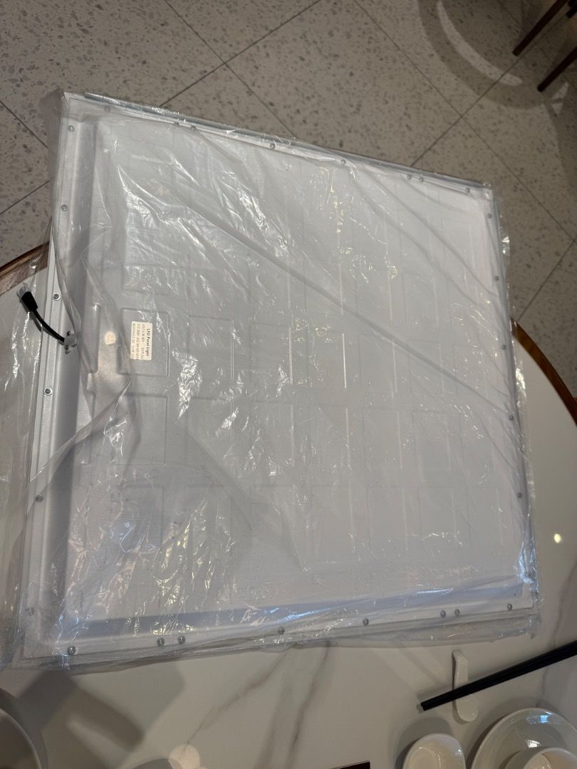 LED Panel Light 24W 3000K 600x600x32mm (Category: Lighting) located in Pasig City. Submitted by skykok2144 (Listing ID 1468981955, Image 2). Description: - Brand new, still in original protective plastic wrap - Size: 600x600x32mm | Power: 24W - Color Temperature: Warm White (3000K) - Beam Angle: 120 degrees for wide coverage - Voltage: AC85-265V - Housing: IP40 rated with attached wiring connector Original Price P1490/ pcs, now P999/pcs Come with