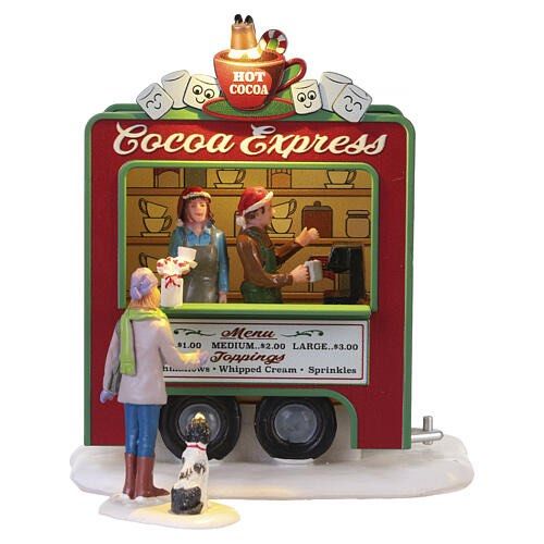 Lemax Cocoa Express Hot Cocoa Stand Village Figurine (Category: Figurines & Statues) located in Santiago. Submitted by kitalpanga (Listing ID 1469005621, Image 1). Description: Battery operated / AC adaptable - Authentic Lemax Cocoa Express lighted hot cocoa stand - Festive red and green trailer cart design featuring two vendors and a customer with a dog - Includes detailed menu board and marshmallow toppers - Features a working light-up top cup 