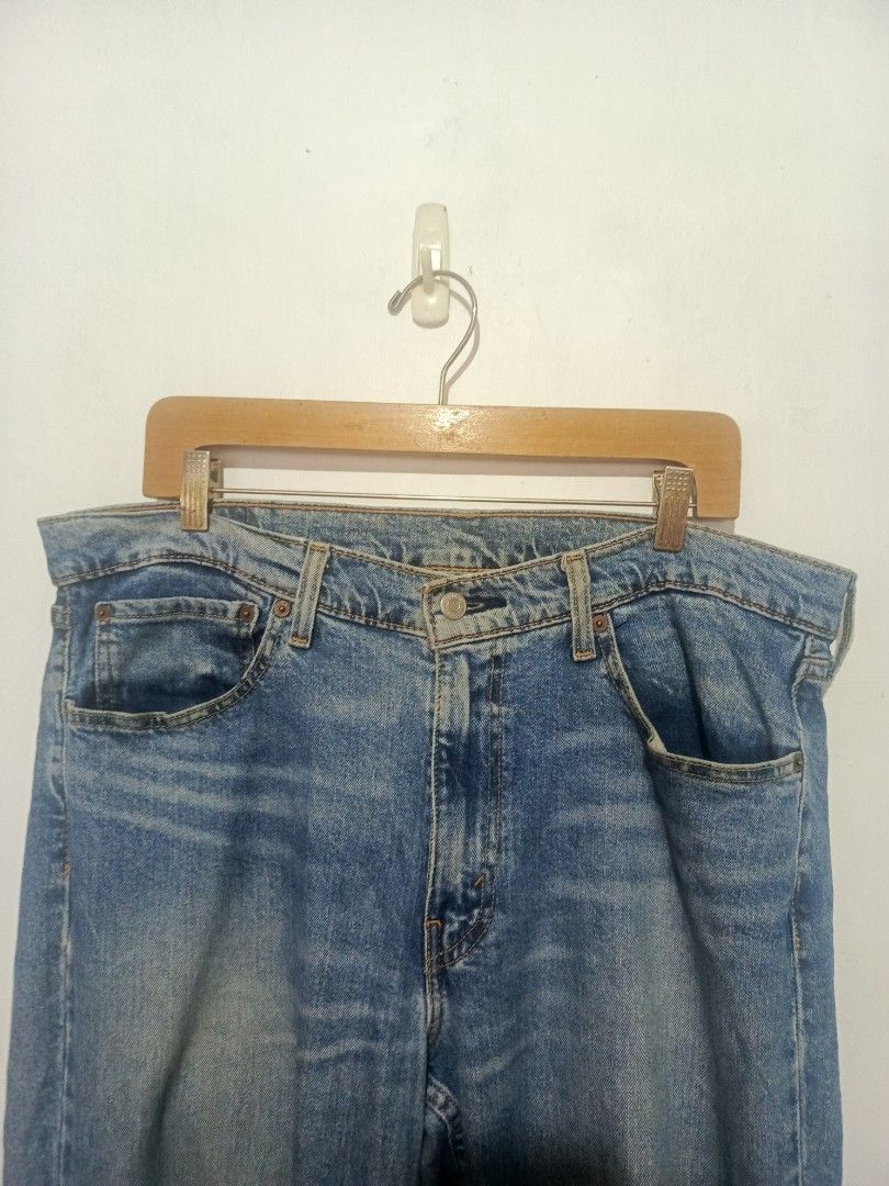 LEVI'S 511 MEDIUM WASH PANTS (Category: Jeans) located in Baguio. Submitted by 074thriftmania (Listing ID 1468966307, Image 3). Description: - Brand: Levi's - Model: 511 Slim Fit Jeans - Color/Wash: Medium wash denim - Size: W36 L34 - Details: Classic five-pocket styling, zip fly, button closure, leather back patch, and iconic red tab - Origin: Made in Pakistan - Condition: Great everyday staple, well-maintained waistline 38" length 46" leg openi