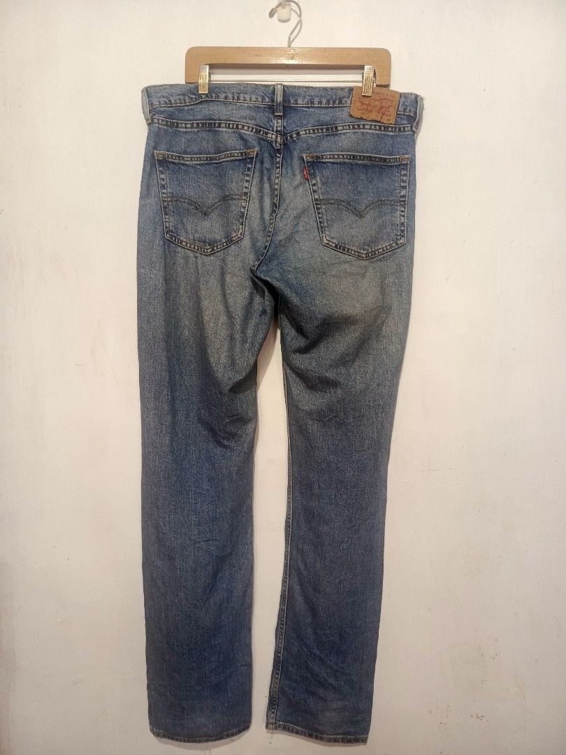 LEVI'S 511 MEDIUM WASH PANTS (Category: Jeans) located in Baguio. Submitted by 074thriftmania (Listing ID 1468966307, Image 2). Description: - Brand: Levi's - Model: 511 Slim Fit Jeans - Color/Wash: Medium wash denim - Size: W36 L34 - Details: Classic five-pocket styling, zip fly, button closure, leather back patch, and iconic red tab - Origin: Made in Pakistan - Condition: Great everyday staple, well-maintained waistline 38" length 46" leg openi