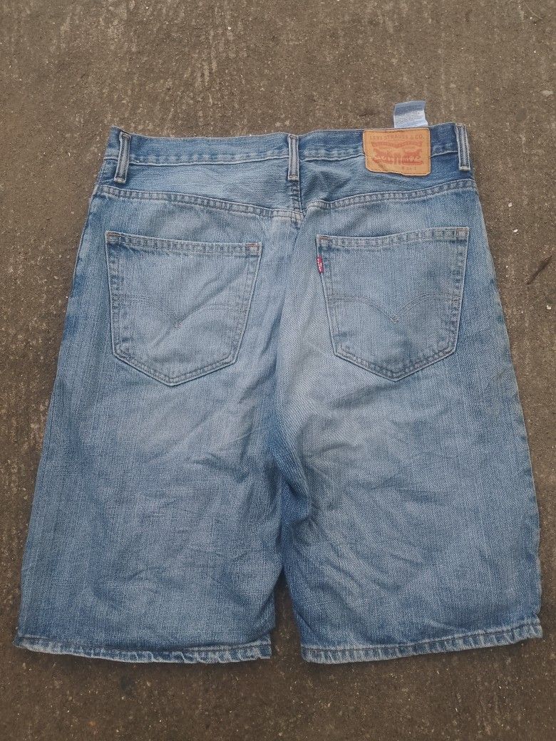 Levi's 569 Denim Shorts Size W34 (Category: Shorts) located in Bacolod City. Submitted by carlo1019 (Listing ID 1469127203, Image 1). Description: - Brand: Levi's 569 - Style: Denim jorts / Vintage skate style - Wash: Light wash - Size: W34 - Features: Classic fit, 5-pocket design, belt loops, button fly - Details: Leather patch on back waistband, iconic red tab on rear pocket.