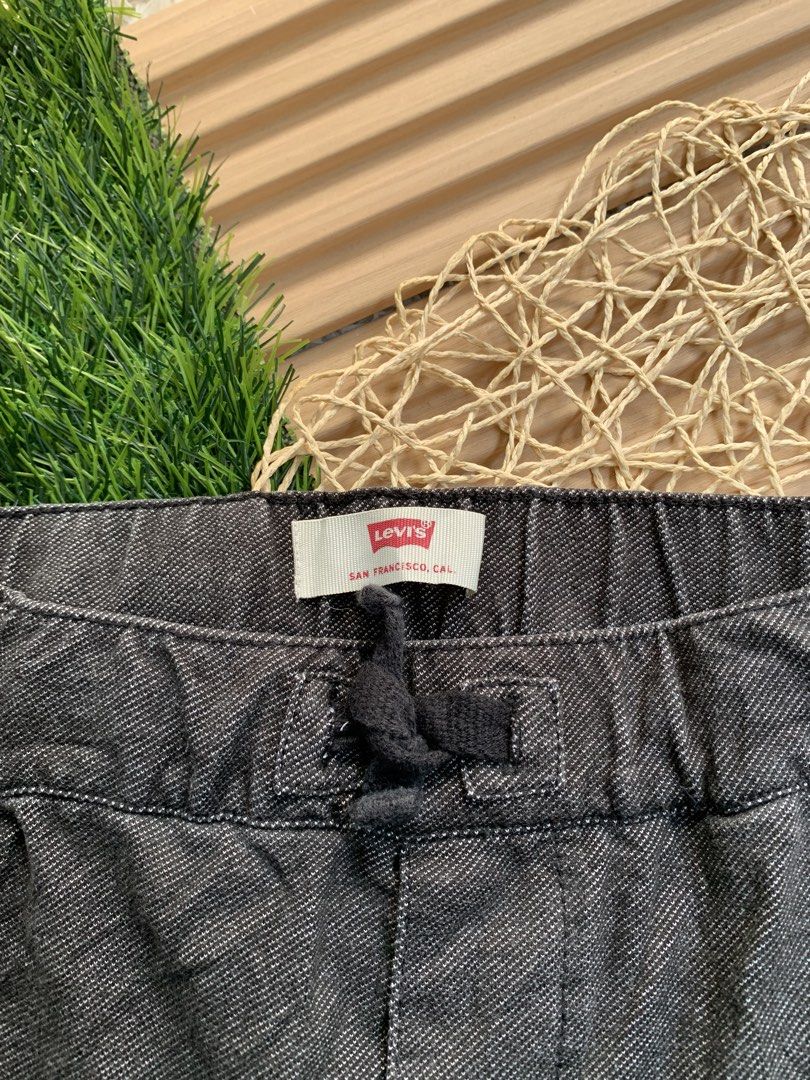 Levi's Grey Drawstring Denim Shorts Kids Size L (Category: Shorts) located in Cebu City. Submitted by omaryjoy3583408 (Listing ID 1469090197, Image 2). Description: - Brand: Levi's - Color: Grey denim - Size: L (Best for ages 12-13 years, height 152-158 cm) - Waistband: Elastic with adjustable drawstring - Pockets: Two front pockets, two back pockets with signature Levi's tag - Material: Comfortable cotton blend, ideal for everyday wear.
