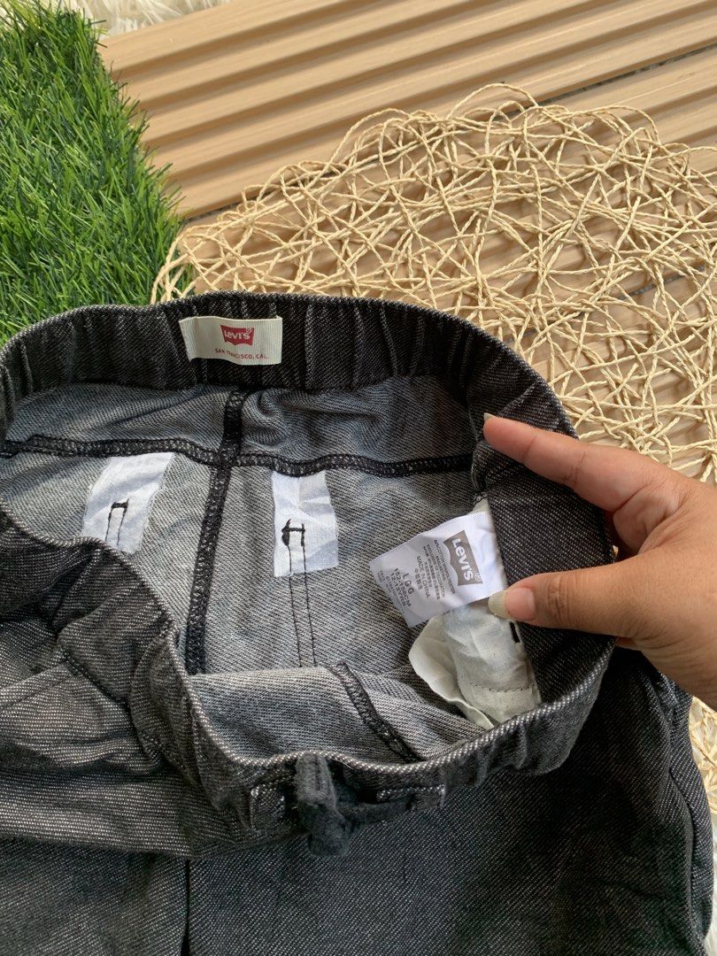 Levi's Grey Drawstring Denim Shorts Kids Size L (Category: Shorts) located in Cebu City. Submitted by omaryjoy3583408 (Listing ID 1469090197, Image 3). Description: - Brand: Levi's - Color: Grey denim - Size: L (Best for ages 12-13 years, height 152-158 cm) - Waistband: Elastic with adjustable drawstring - Pockets: Two front pockets, two back pockets with signature Levi's tag - Material: Comfortable cotton blend, ideal for everyday wear.
