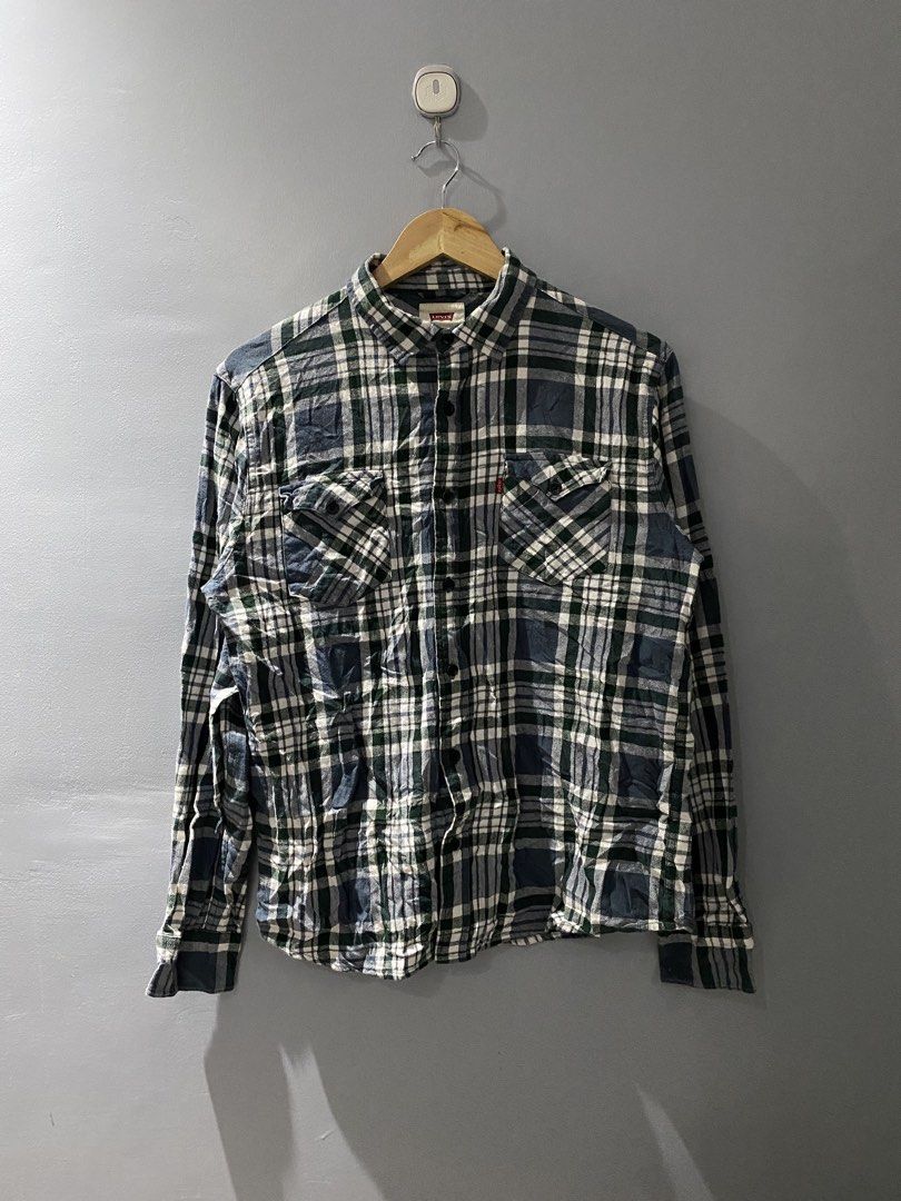 Levi's Plaid Long Sleeve Button-Down Shirt (Category: Longsleeves) located in Bangued. Submitted by koroysthrifts (Listing ID 1469074341, Image 2). Description: - Brand: Levi's 20x26 - Colorway: Green, navy blue, and white plaid - Material: 100% cotton (soft and comfortable for daily wear) - Features: Button-down front, classic collar, dual chest pockets, and buttoned cuffs - Fit: Standard men's sizing - Condition: Excellent quality, ready to wea