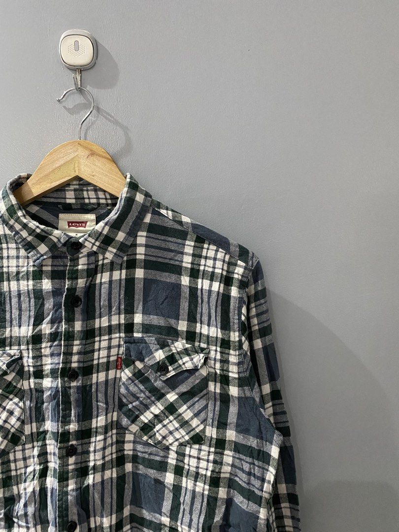 Levi's Plaid Long Sleeve Button-Down Shirt (Category: Longsleeves) located in Bangued. Submitted by koroysthrifts (Listing ID 1469074341, Image 1). Description: - Brand: Levi's 20x26 - Colorway: Green, navy blue, and white plaid - Material: 100% cotton (soft and comfortable for daily wear) - Features: Button-down front, classic collar, dual chest pockets, and buttoned cuffs - Fit: Standard men's sizing - Condition: Excellent quality, ready to wea