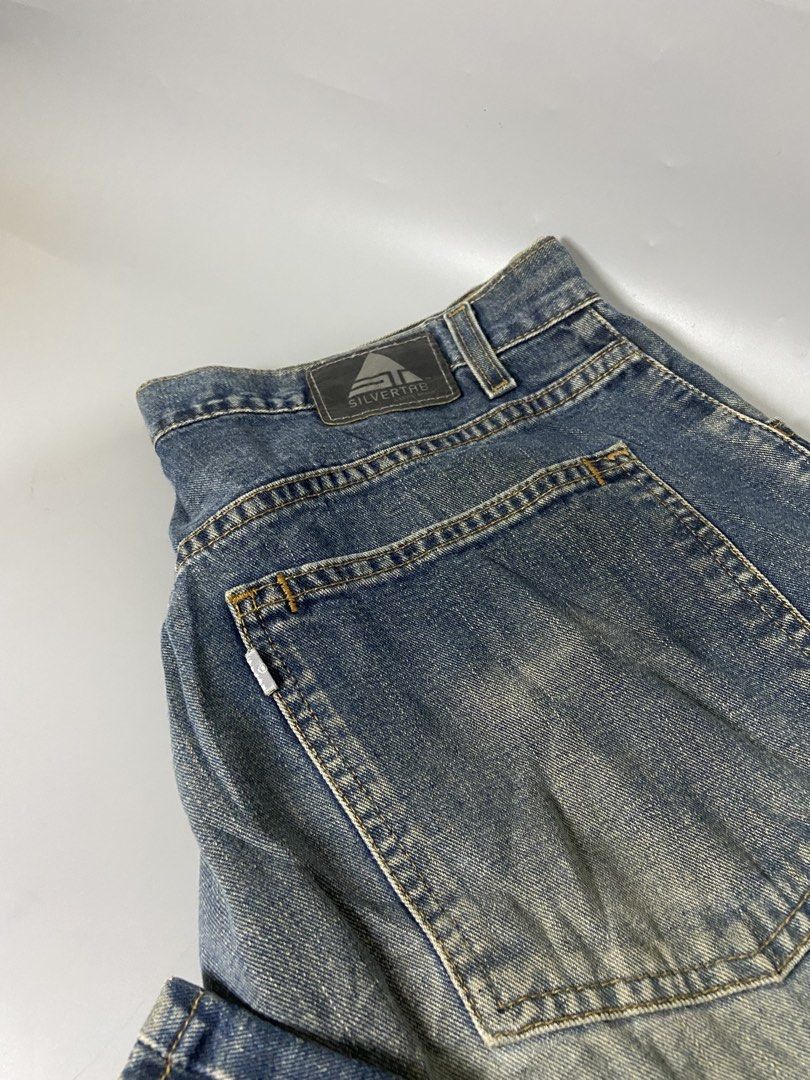LEVIS silver tab (Category: Jeans) located in Cavite. Submitted by jayson_04 (Listing ID 1468934807, Image 2). Description: Vintage levis (silver tab) issue: distress sa helm (see pic) dimes: 34x40 (11 leg opening) baggy.