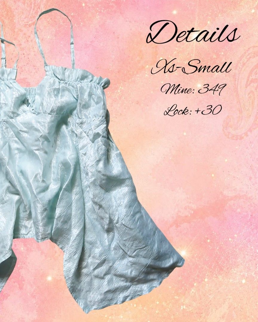 Light Blue Satin Ruffle Camisole Top XS S (Category: Sleeveless) located in Antipolo. Submitted by mochisky (Listing ID 1468972015, Image 2). Description: - Color: Light blue - Material: Textured, crinkled satin fabric - Size: XS-Small - Design details: Adjustable spaghetti straps and sweet ruffle trim along the neckline - Hemline: Chic asymmetrical flared hem - Condition: Brand new / Excellent.