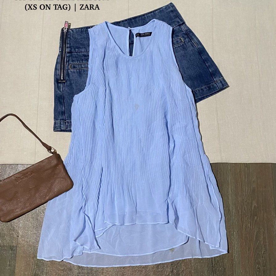 Light blue zara basic top (Category: Others Tops) located in Manila. Submitted by thriftfindsbyshei-2nd (Listing ID 1468989710, Image 1). Description: Washed already.