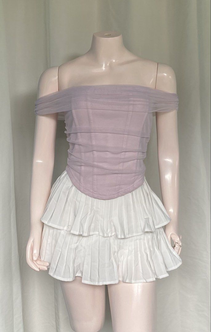Lilac Off-Shoulder Tulle Corset Top Size Medium (Category: Sleeveless) located in Batangas. Submitted by mynne_09 (Listing ID 1469004475, Image 2). Description: - Color: Lilac - Size: Medium - Style: Off-shoulder corset top with sheer tulle overlay - Versatile: Easy to style with skirts or high-waisted jeans for dates and casual days.