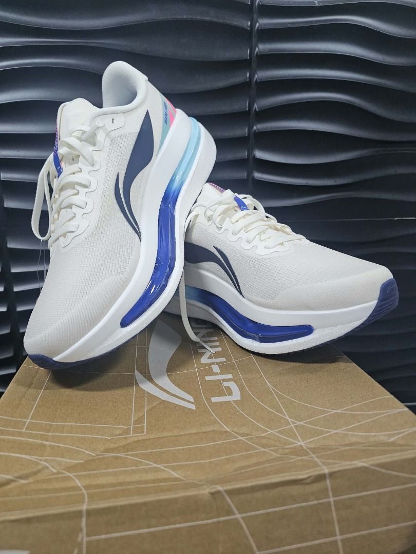 Li-Ning Red Hare 9 Ultra Running Shoes (Category: Sneakers) located in Caloocan City. Submitted by freeturtle.a5f464 (Listing ID 1468946017, Image 1). Description: - Brand: Li-Ning - Model: Red Hare 9 Ultra (ARPW007-16) - Color: White with blue and pink gradient midsole - Size: US 9, EUR 42.5, 265mm - Condition: Brand new, unworn, straight from the box - Features: Lightweight mesh upper and high-cushion sole setup - Inclusions: Original box and a