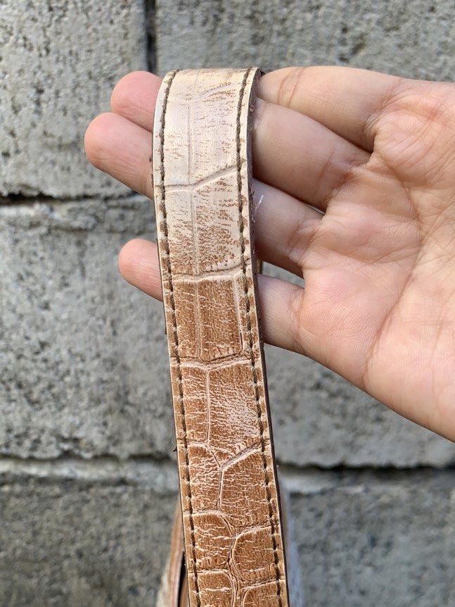 Liz Claiborne (Category: Shoulder Bags) located in Bayombong. Submitted by declutterbyriri (Listing ID 1468997102, Image 3). Description: - Faded on strap and some part - minimal stain/dirt - permanent yellowish color inside (i I think dahil na stock) - minimal flaw.