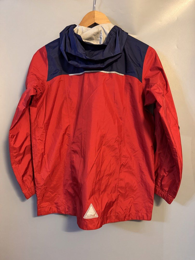 l.l.bean Red and Blue Hooded Rain Jacket (Category: Coats, Jackets and Outerwear) located in Alaminos. Submitted by outfitcheck.ph (Listing ID 1469100763, Image 2). Description: - Brand: L.L.Bean - Size: Kids L (14-16) - Color: Red and blue color block - Closure: Full zip front with storm flap - Pockets: 1 chest zip pocket, 2 lower zip pockets - Safety: Reflective piping on shoulders and back - Lining: Comfortable lined interior for lightweight w