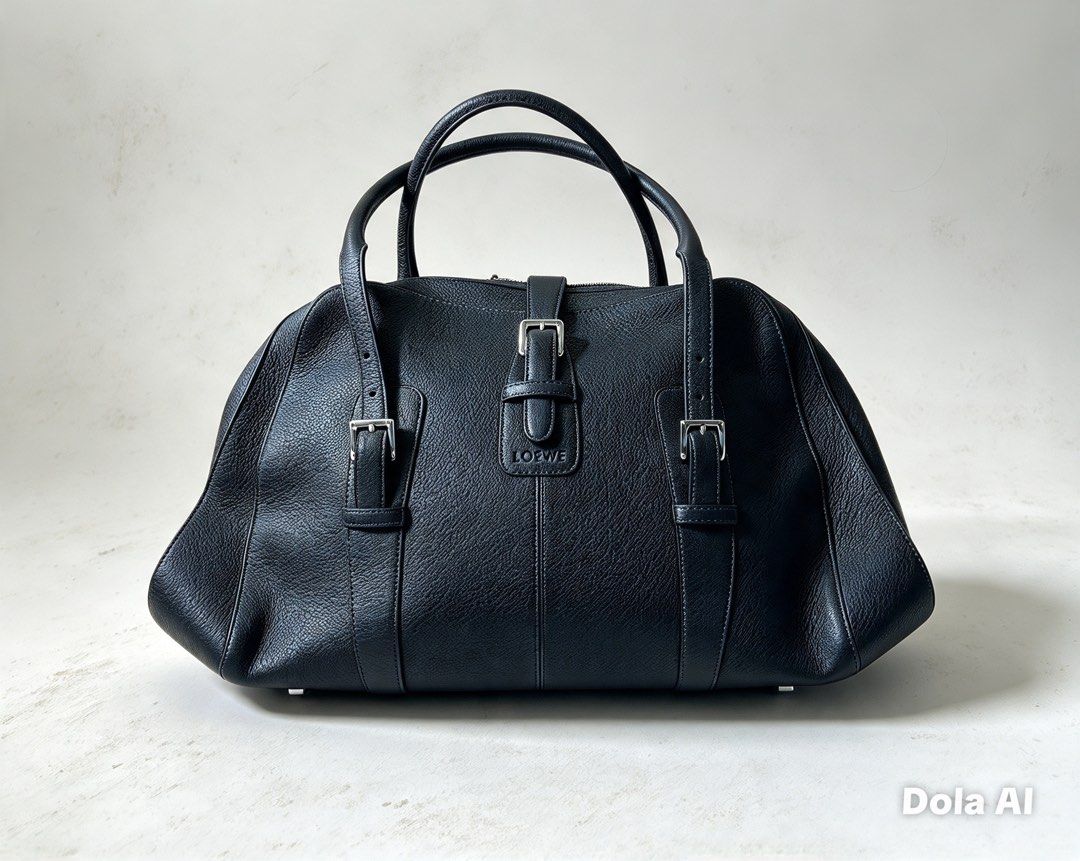Loewe Black Leather Handbag (Category: Luxury Bags & Wallets) located in Aroroy. Submitted by mahinaanlangs (Listing ID 1469029170, Image 1). Description: Loewe Black Leather Handbag Legit Large Size Very Good Condition Issue:Kunti Gasgas At Maliit na punit sa loob Pero Bagong Bago pa sya sa labas 12k+Sf .