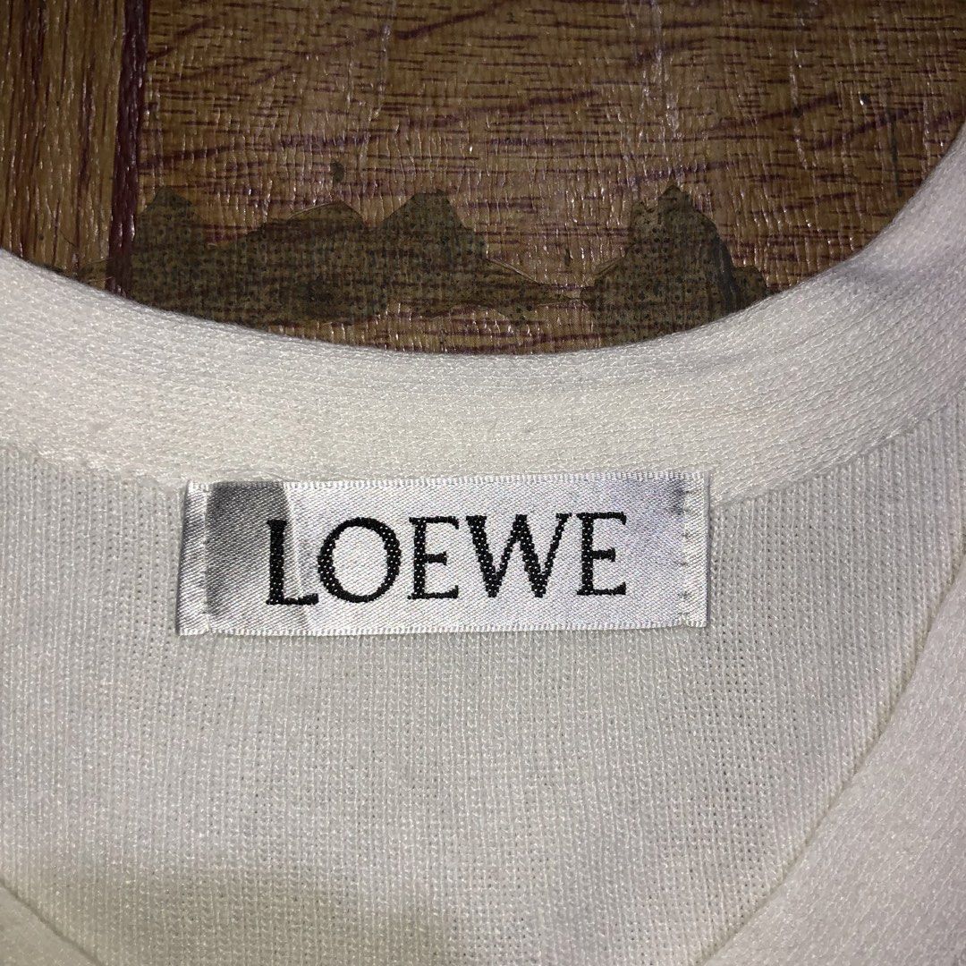 LOEWE EMBOSSED LOGO TANK TOP (Category: Luxury Apparel) located in Dasmarinas. Submitted by cornyxmessy (Listing ID 1469100297, Image 2). Description: width - 14 length - 16.