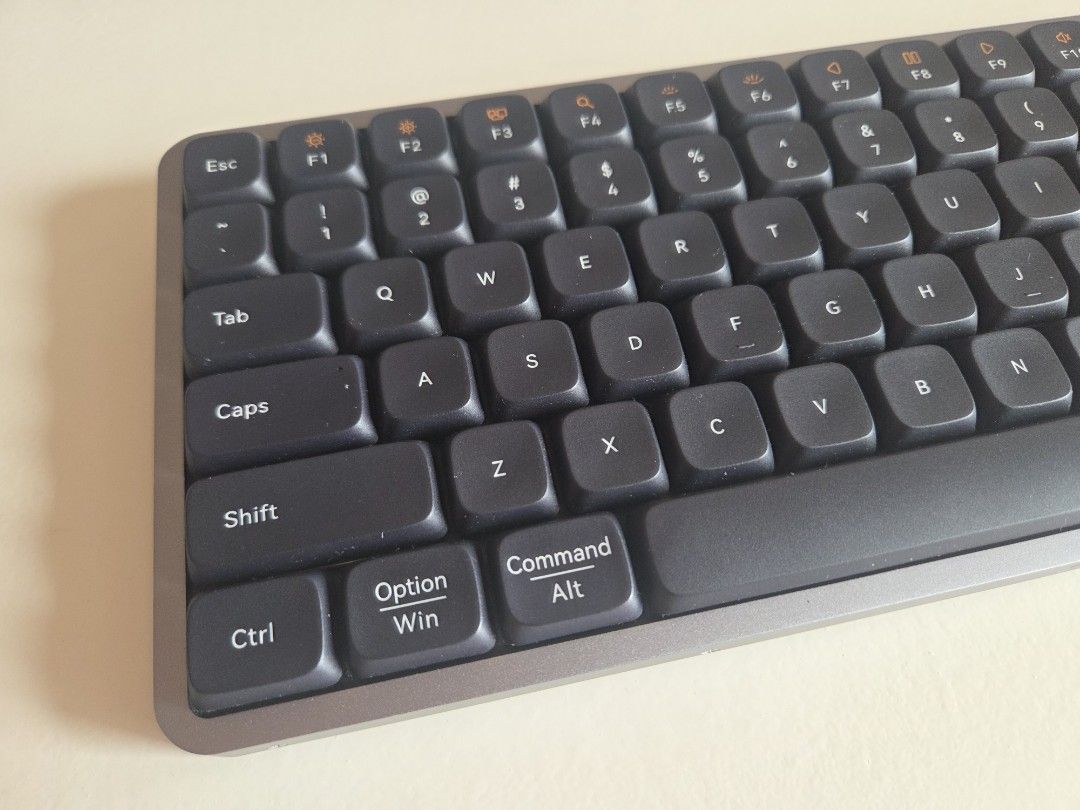 Lofree Flow84 Low-Profile Mechanical Keyboard (Category: Computer Keyboard) located in Pasig City. Submitted by set_rolento (Listing ID 1469080190, Image 3). Description: - Color: Dark Grey - Layout: Compact 84 keys - Switches: Kailh full POM switches - Build: Premium and durable aluminum-alloy body - Lighting: Built-in white backlight and RGB sidelights - Features: Hot-swappable setup ready to go - No box - Relubed and tuned.