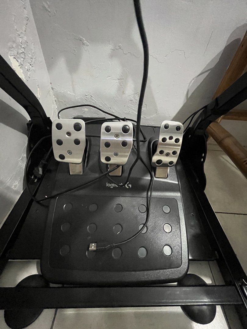 Logitech G29 Racing Wheel Driving Force Shifter and Stand (Category: Controllers) located in Manila. Submitted by cedsoriano89686 (Listing ID 1468963403, Image 2). Description: - Complete Logitech G29 racing setup including pedals, Driving Force shifter, and a heavy-duty metal stand - Leather-wrapped wheel maintains a great, tactile texture - Pedals and shifter are 100% fully functional - Original boxes included for both the wheel and shifter - I