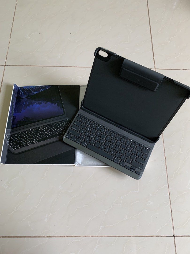 LOGITECH SLIM FOLIO PRO for Ipad Pro 12.9 inch 3rd Generation (Category: Cases & Covers) located in Manila. Submitted by mau13 (Listing ID 1468965926, Image 1). Description: For Sale Brand-new Logitech Slim Folio Pro Ipad Pro 12.9 Inch (3rd Generation) Graphite Case with Integrated Bluetooth Keyboard .