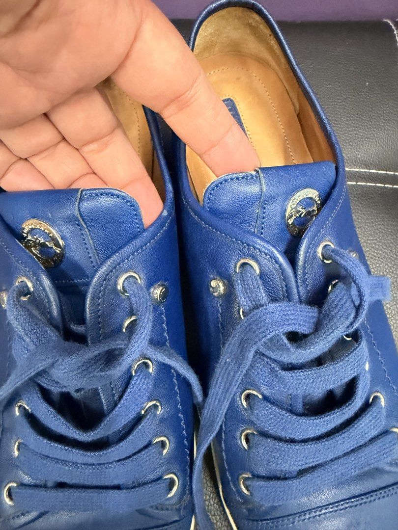 Longchamp Blue Leather Sneakers (Category: Sneakers) located in Quezon City. Submitted by ellamenopi (Listing ID 1468937821, Image 3). Description: - Brand: Longchamp - Color: Bright blue with tan leather lining - Closure: Lace-up with silver eyelets and branded metal tongue medallion - Condition: Uppers are clean with minimal creasing; white rubber outsoles show normal wear from previous use - Perfect casual statement sneakers for everyday wear 