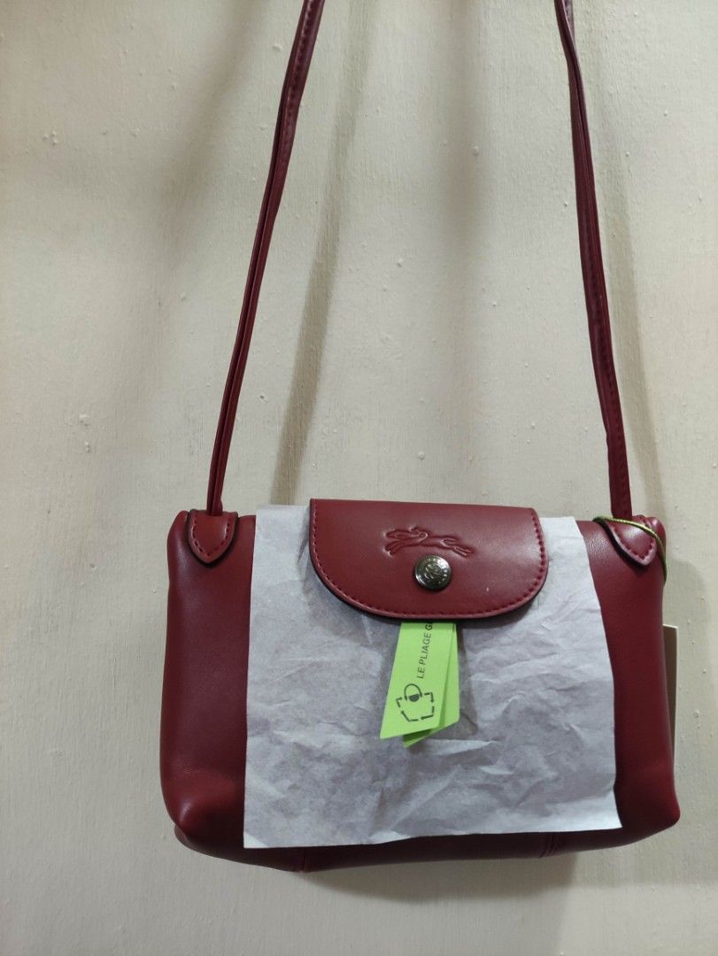 Longchamp Crossbody Bag (Category: Luxury Bags & Wallets) located in Quezon City. Submitted by pprzi_89 (Listing ID 1467892239, Image 1). Description: + shipping fee - Condition: Brand new - Front pocket under flap.