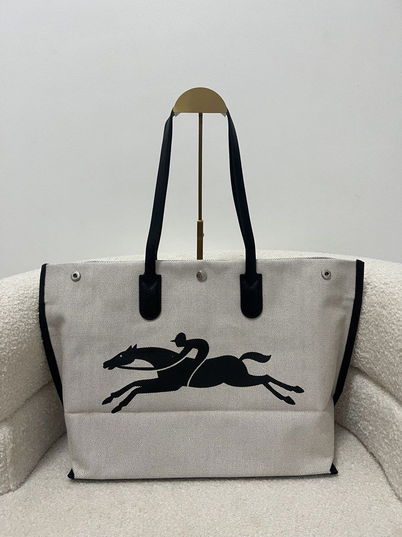 Longchamp Logo Canvas Tote Bag (Category: Tote Bags) located in Abulug. Submitted by jamiecammie (Listing ID 1468994955, Image 1). Description: .