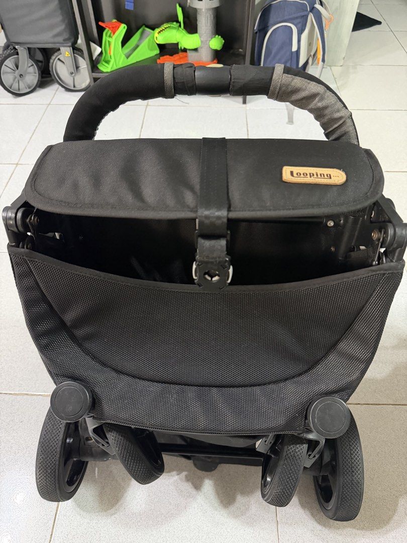 Looping Squizz Stroller (Category: Strollers) located in Paranaque City. Submitted by jea.jeya (Listing ID 1468980043, Image 2). Description: - Model: Looping Squizz Baby Stroller - Color: Sleek Black and Grey - Compact and easy-fold design for hassle-free transport and storage - Comfortable padded seat with a secure 5-point harness system - Adjustable canopy for reliable sun protection - Handy back storage pocket for quick access to essentials -