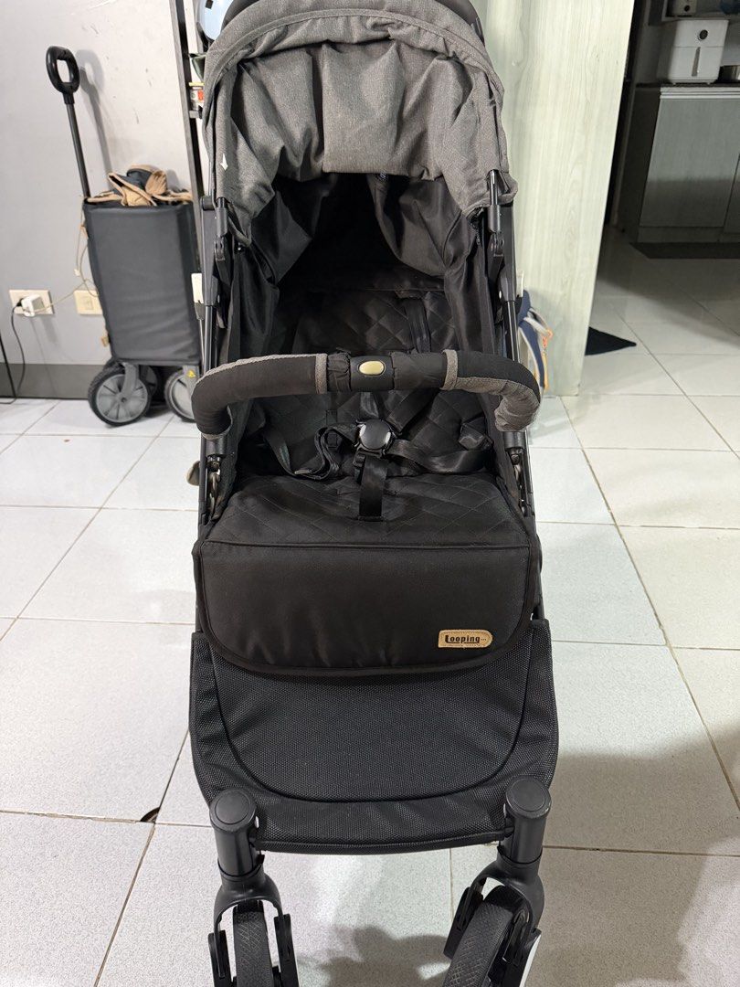 Looping Squizz Stroller (Category: Strollers) located in Paranaque City. Submitted by jea.jeya (Listing ID 1468980043, Image 3). Description: - Model: Looping Squizz Baby Stroller - Color: Sleek Black and Grey - Compact and easy-fold design for hassle-free transport and storage - Comfortable padded seat with a secure 5-point harness system - Adjustable canopy for reliable sun protection - Handy back storage pocket for quick access to essentials -