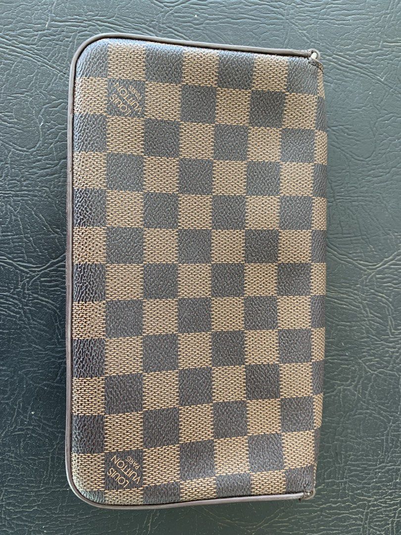 Louis Vuitton Damier Ebene clutch bag (Category: Luxury Bags & Wallets) located in Tarlac. Submitted by abborns (Listing ID 1468966482, Image 2). Description: This is my own preloved (first owner) LV Clutch/Sling bag What you see is what you get.. Used it few times, Sign of usage barely noticeable.. Please manage your expectations.. Shipping Nationwide NO COD LOC: Tarlac City.