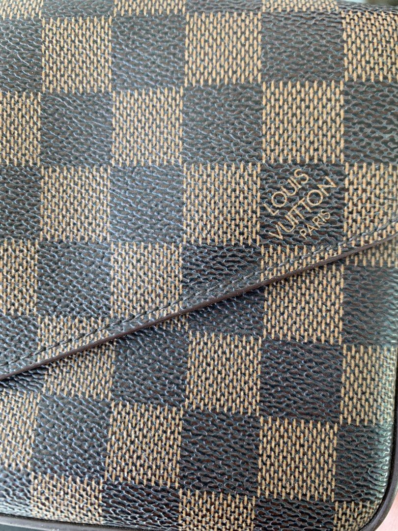 Louis Vuitton Damier Ebene clutch bag (Category: Luxury Bags & Wallets) located in Tarlac. Submitted by abborns (Listing ID 1468966482, Image 3). Description: This is my own preloved (first owner) LV Clutch/Sling bag What you see is what you get.. Used it few times, Sign of usage barely noticeable.. Please manage your expectations.. Shipping Nationwide NO COD LOC: Tarlac City.