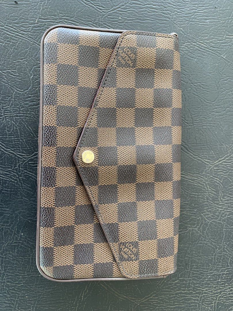 Louis Vuitton Damier Ebene clutch bag (Category: Luxury Bags & Wallets) located in Tarlac. Submitted by abborns (Listing ID 1468966482, Image 1). Description: This is my own preloved (first owner) LV Clutch/Sling bag What you see is what you get.. Used it few times, Sign of usage barely noticeable.. Please manage your expectations.. Shipping Nationwide NO COD LOC: Tarlac City.