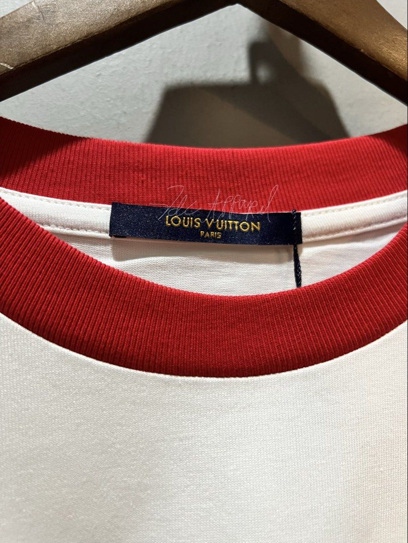 Louis Vuitton Graphic T-Shirt | White & Red (Category: Luxury Apparel) located in Imus. Submitted by vdc.apparel (Listing ID 1469111177, Image 2). Description: Almost new never used Louis Vuitton Graphic T-Shirt | White & Red.