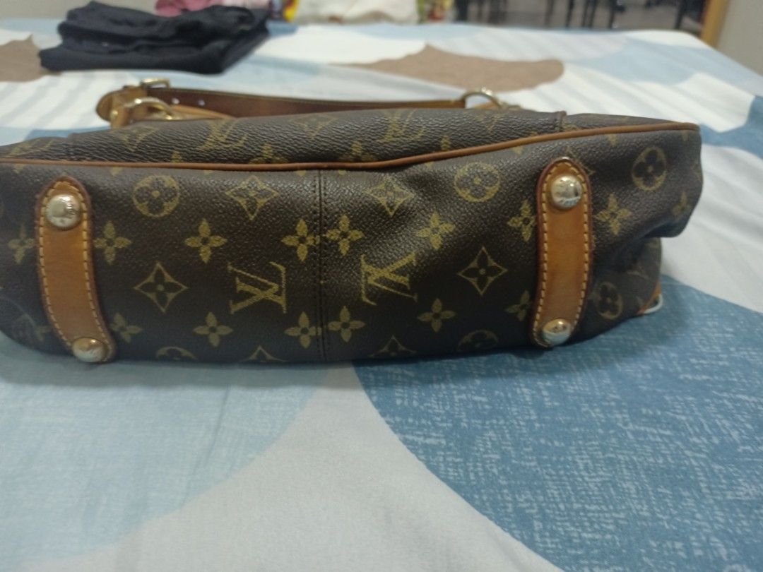 Louis Vuitton Monogram Canvas Tote Handbag (Category: Luxury Bags & Wallets) located in Manila. Submitted by argalaeq (Listing ID 1469018314, Image 3). Description: - Authentic Louis Vuitton shoulder bag in classic brown/tan monogram canvas - Features gold-tone hardware, signature front plaque, and durable leather trim - Spacious interior with sturdy, comfortable handles for everyday wear - Condition: Normal signs of use, minor scratching on hard