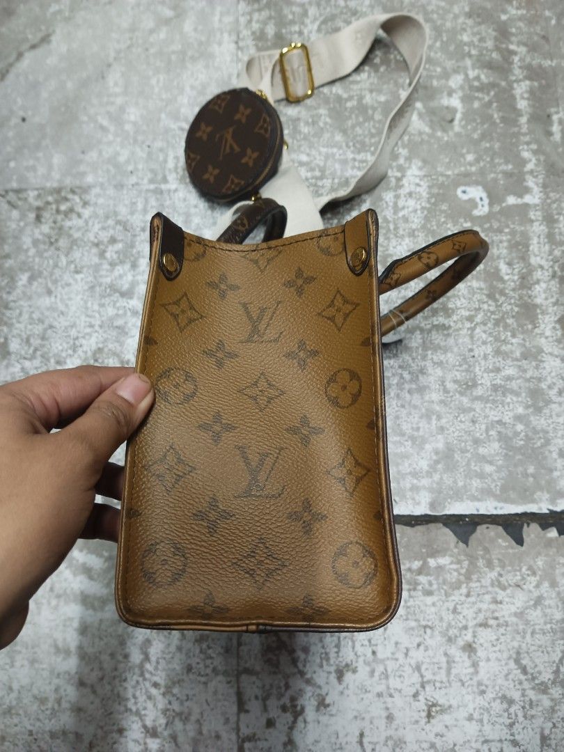 Louis Vuitton on the go monogram bag (Category: Luxury Bags & Wallets) located in Baguio. Submitted by brandeditems16 (Listing ID 1469138158, Image 2). Description: - Classic brown monogram canvas design with a structured silhouette - Includes dual top handles for hand carry and a wide beige adjustable shoulder strap - Comes with a trendy, removable small round zipped pouch on the strap - Finished with elegant gold-tone hardware details - Spaciou
