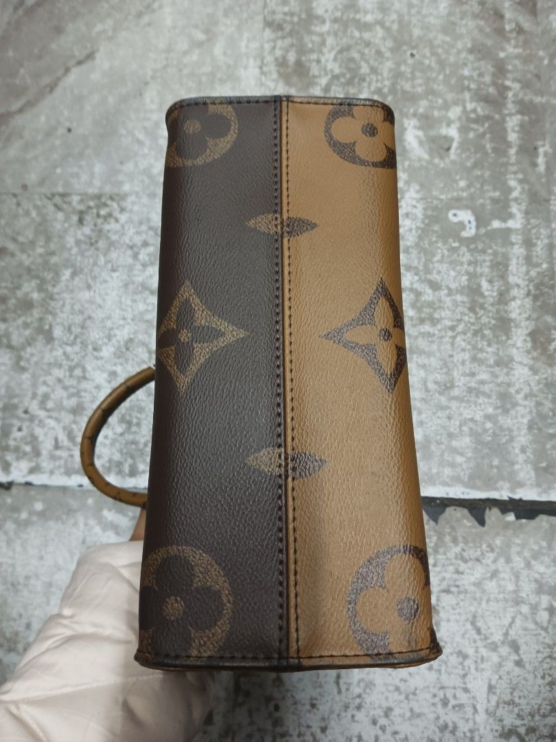 Louis Vuitton on the go monogram bag (Category: Luxury Bags & Wallets) located in Baguio. Submitted by brandeditems16 (Listing ID 1469138158, Image 3). Description: - Classic brown monogram canvas design with a structured silhouette - Includes dual top handles for hand carry and a wide beige adjustable shoulder strap - Comes with a trendy, removable small round zipped pouch on the strap - Finished with elegant gold-tone hardware details - Spaciou