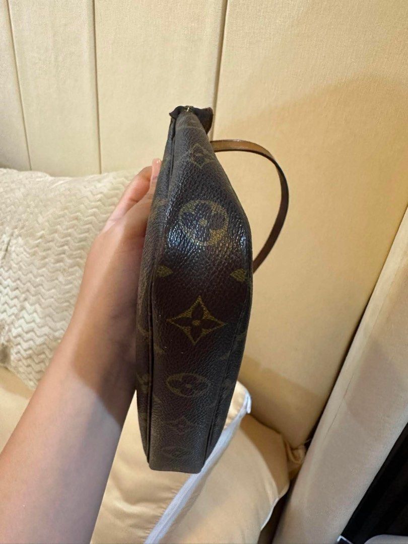 Louis Vuitton Pochette in Monogram Canvas (Category: Luxury Bags & Wallets) located in Baliuag. Submitted by meggabb (Listing ID 1468945124, Image 3). Description: Authentic, with code, rfs: not being used anymore Model: Louis Vuitton Pochette Accessoires * Canvas: Classic Monogram coated canvas * Shape: Rectangular zip pouch * Hardware: Gold-tone measuring 23.5 × 13.5 × 4 cm. .