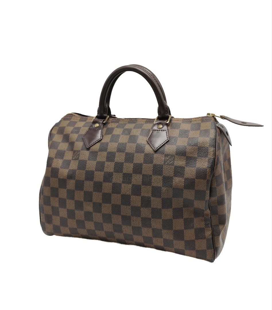 Louis Vuitton Speedy 30 in Damier Ebene Canvas and Aged Hardware (Datecode: SP1087) (Category: Luxury Bags & Wallets) located in Taguig. Submitted by pursemaison (Listing ID 1468967189, Image 2). Description: Louis Vuitton Speedy 30 in Damier Ebene Canvas and Aged Hardware (Datecode: SP1087) Price: Php 40,600.00 (Cash & bank transfer discounts may be available. Please contact our Maison Advisors for details.) Condition: Fair (7.5/10) Exterior: Mo