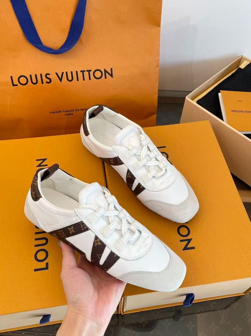 Louis Vuitton White Monogram Sneakers (Category: Sneakers) located in Paranaque City. Submitted by emoemobern98221 (Listing ID 1469005165, Image 1). Description: - Authentic white leather sneakers with LV monogram trim - Stylish suede toe cap details and secure lace-up closure - Clean, versatile design suitable for any outfit - Complete full set: includes original branded box, shopping bag, dust bag, booklet, and matching socks - Condition: Brand