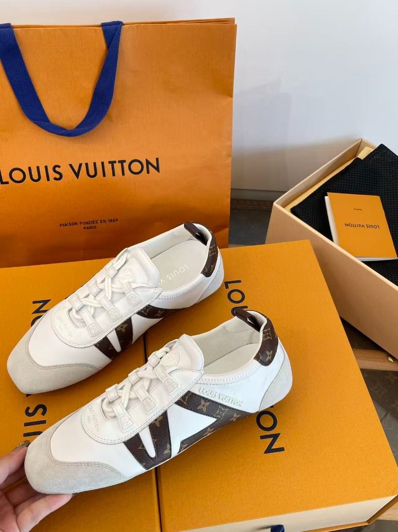 Louis Vuitton White Monogram Sneakers (Category: Sneakers) located in Paranaque City. Submitted by emoemobern98221 (Listing ID 1469005165, Image 3). Description: - Authentic white leather sneakers with LV monogram trim - Stylish suede toe cap details and secure lace-up closure - Clean, versatile design suitable for any outfit - Complete full set: includes original branded box, shopping bag, dust bag, booklet, and matching socks - Condition: Brand