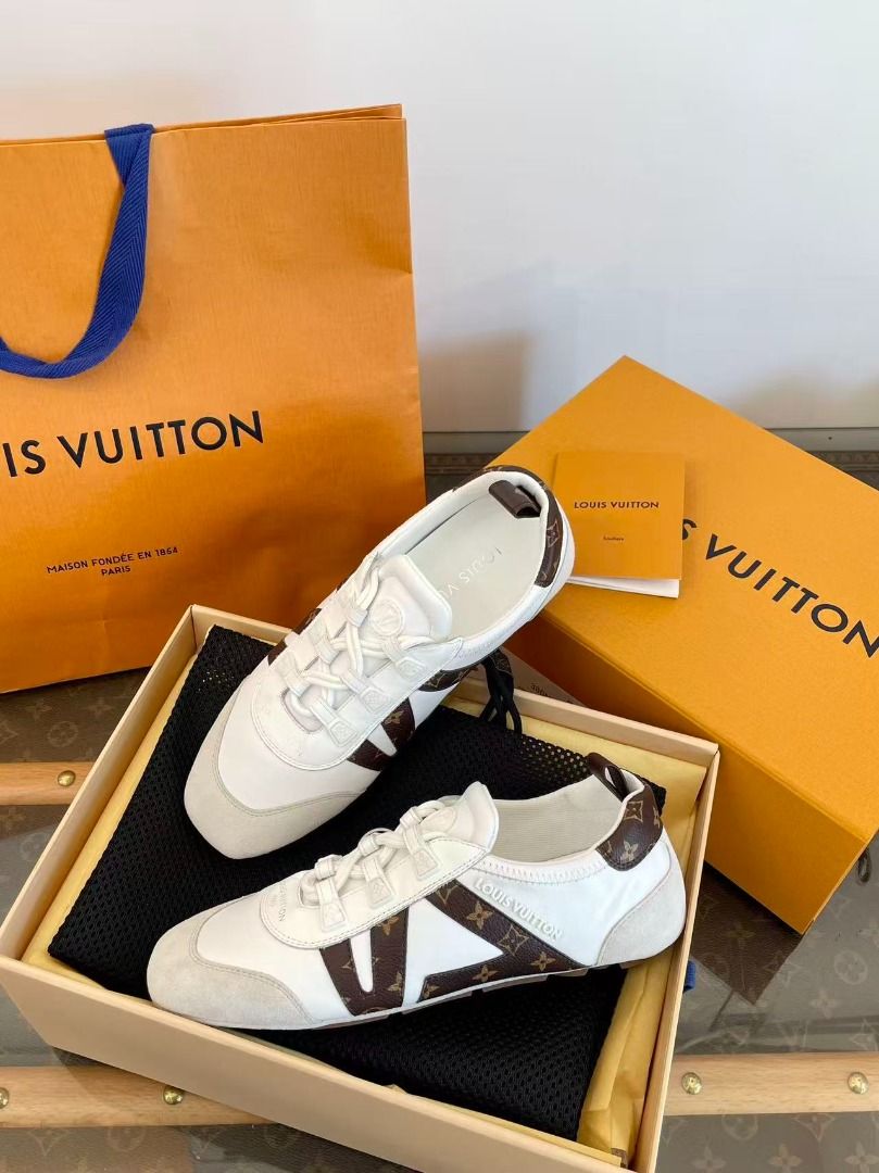 Louis Vuitton White Monogram Sneakers (Category: Sneakers) located in Paranaque City. Submitted by emoemobern98221 (Listing ID 1469005165, Image 2). Description: - Authentic white leather sneakers with LV monogram trim - Stylish suede toe cap details and secure lace-up closure - Clean, versatile design suitable for any outfit - Complete full set: includes original branded box, shopping bag, dust bag, booklet, and matching socks - Condition: Brand
