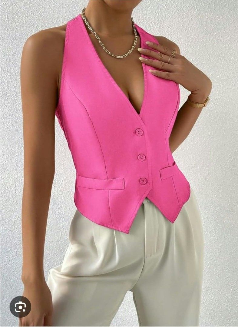 Lovito Pink Halter Vest Size L EU 38 (Category: Sleeveless) located in Manila. Submitted by duffy-080 (Listing ID 1468943045, Image 1). Description: - Brand: Lovito - Color: Bright Pink - Size: L (EU 38) - Design: Halter vest with button-down front (3 buttons), false pocket flaps at the waist, and a stylish racerback - Condition: Brand new with original tags attached (unworn) -best fit medium. brand new.