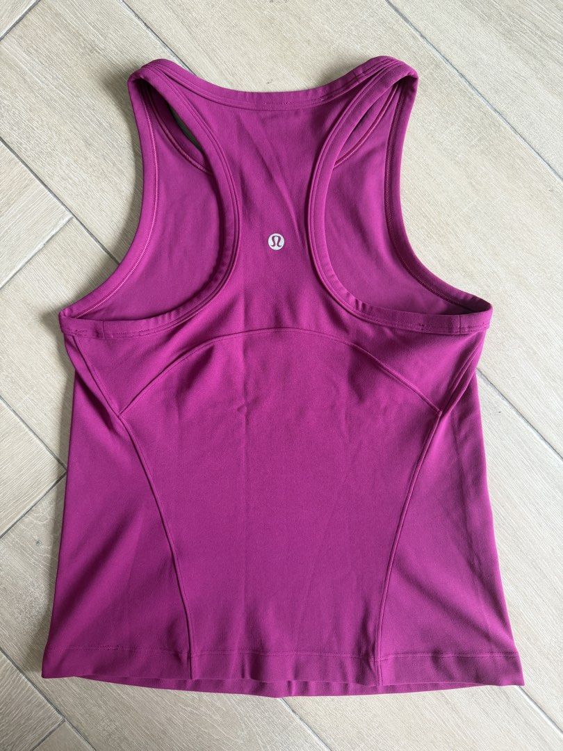 Lululemon Align Waist-Length Racerback Tank Top (Category: Activewear) located in Makati City. Submitted by marionetteh (Listing ID 1468959955, Image 2). Description: Listed price is best price already Item has never been used but size tag has been taken out Size: 6 Color: Magenta Purple RFS: decluttering.