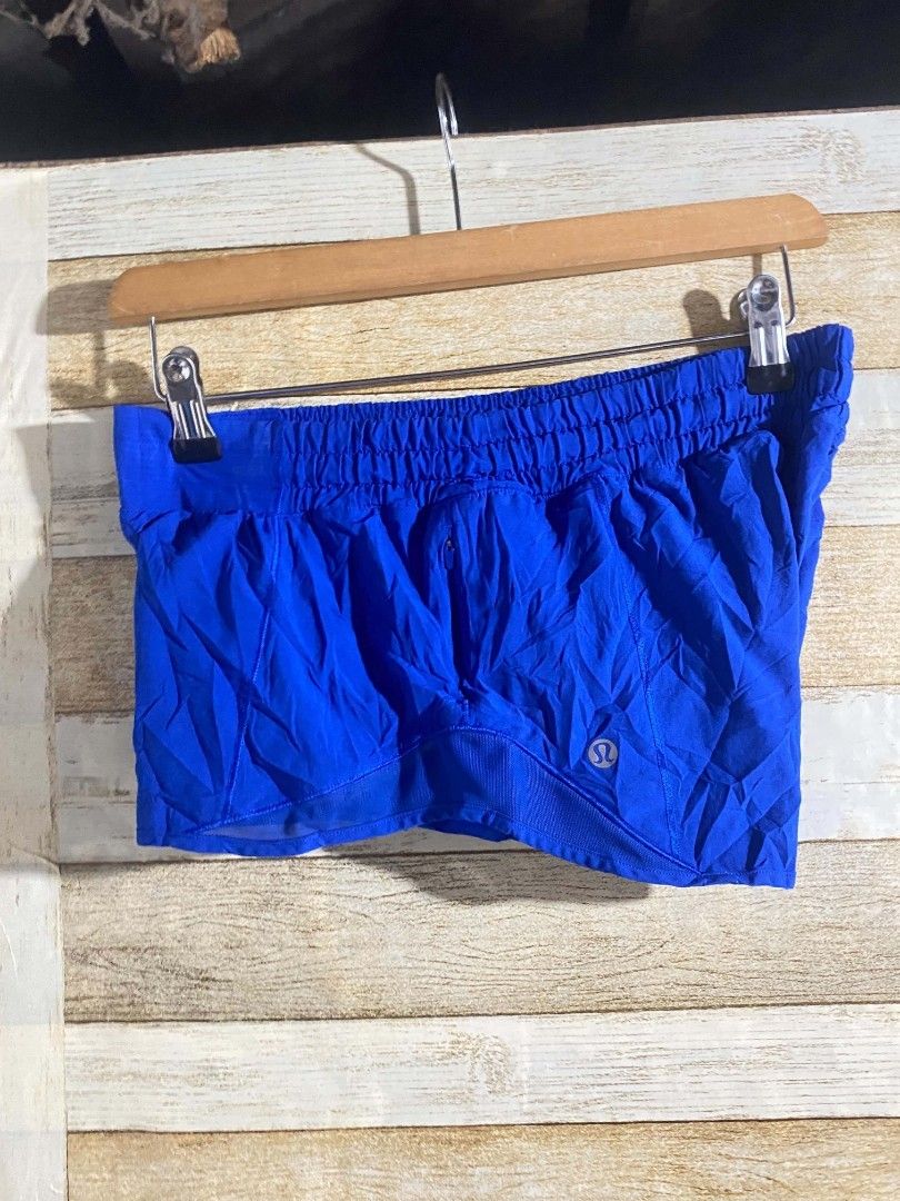 Lululemon Athletic Running Shorts Blue DOT 4 (Category: Shorts) located in Maasin. Submitted by trippythirftyyy (Listing ID 1469103993, Image 1). Description: - Brand: Lululemon - Color: Bright blue -Dot 4 (small) - Ideal for: Running, workouts, and gym sessions - Fit: Comfortable elastic waistband - Storage: Convenient small zippered pocket on the back - Safety: Reflective logo detail near the hem - Material: Lightweight and breathable fabric.