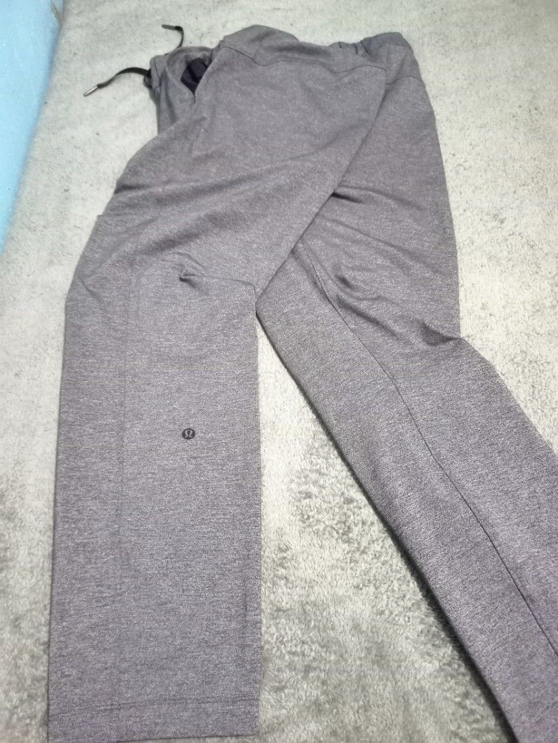Lululemon Dot On The Fly Pants Grey Size 8 (Category: Jeans) located in Manila. Submitted by thecomftrift.co (Listing ID 1468979486, Image 2). Description: - Brand: Lululemon - Style: Dot On The Fly Pants - Color: Grey - Size: 8 - Waist: 31 inches (stretches up to 40 inches) - Length: 38 inches - Details: Elastic waistband with adjustable drawstring, side pockets, and signature logo near the lower leg - Condition: Great everyday athleisure wear w