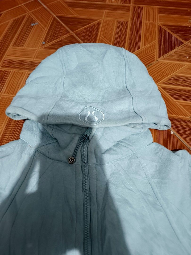 Lululemon Full Zip Hoodie Light Blue (Category: Coats, Jackets and Outerwear) located in Manila. Submitted by dyastenthrift (Listing ID 1469041867, Image 2). Description: - Brand: Lululemon - Color: Light blue - Style: Full-zip hoodie with relaxed fit - Details: Ribbed cuffs and hem, embroidered logo on the hood, matching zipper pull - Material: Comfortable cotton blend - Best for: Casual everyday wear or post-workout.