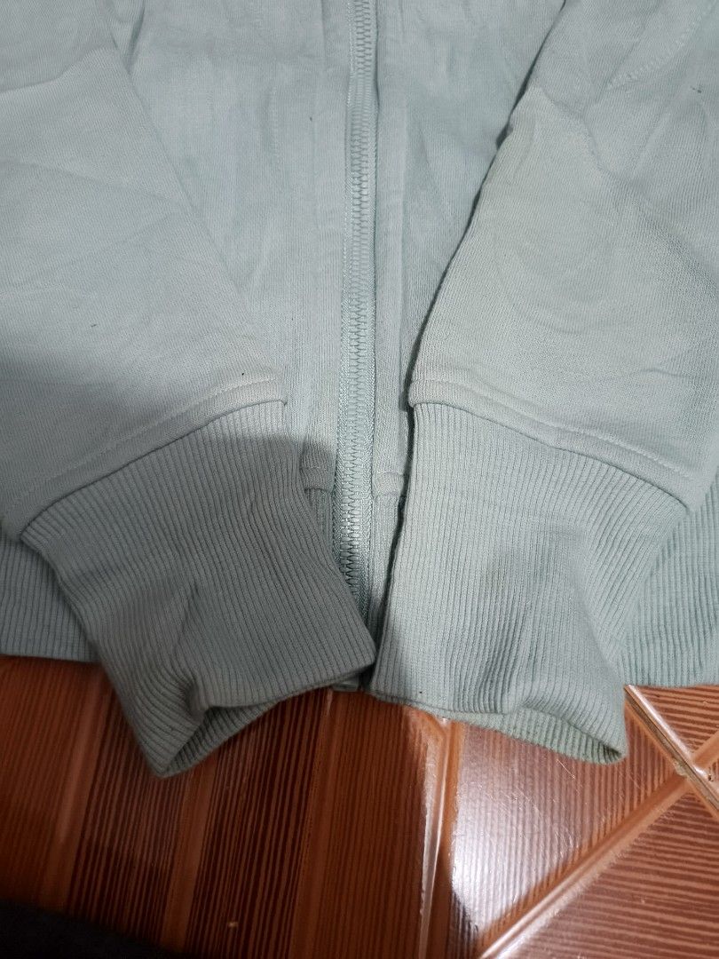 Lululemon Full Zip Hoodie Light Blue (Category: Coats, Jackets and Outerwear) located in Manila. Submitted by dyastenthrift (Listing ID 1469041867, Image 3). Description: - Brand: Lululemon - Color: Light blue - Style: Full-zip hoodie with relaxed fit - Details: Ribbed cuffs and hem, embroidered logo on the hood, matching zipper pull - Material: Comfortable cotton blend - Best for: Casual everyday wear or post-workout.