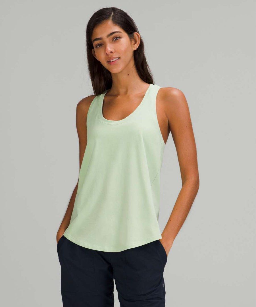 Lululemon Love Tank Top Light Green - Dot 6 (Category: Sleeveless) located in Pagsanjan. Submitted by zhairaaaaa (Listing ID 1469111901, Image 2). Description: - Brand: Lululemon - Style: Racerback tank top with scoop neck and curved hem - Color: Light green - Size: 6 (tag attached) - Material: 94% Pima cotton, 6% Lycra spandex for stretch and comfort - Origin: Made in Peru - Details: Signature Lululemon logo stamped on upper back Verygood condit