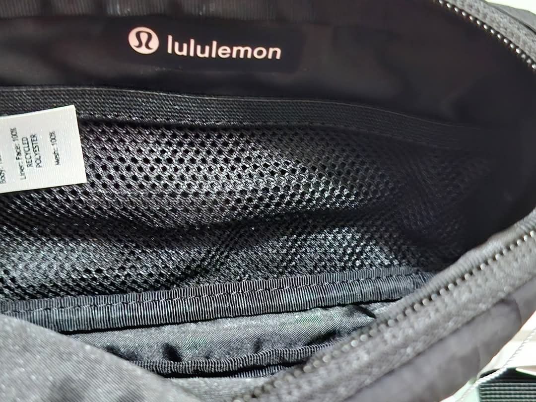 Lululemon Mini Belt Bag Black (Category: Belt bags, Clutches and Pouches) located in Manila. Submitted by closetprincess (Listing ID 1468959056, Image 3). Description: - 100% Authentic Lululemon mini belt bag in classic black - Compact size: 19cm x 10.5cm, perfect for daily essentials - Durable ripstop nylon material built to last - Features an interior mesh pocket and iconic Lululemon logo patch - Adjustable strap with secure plastic buckle clos
