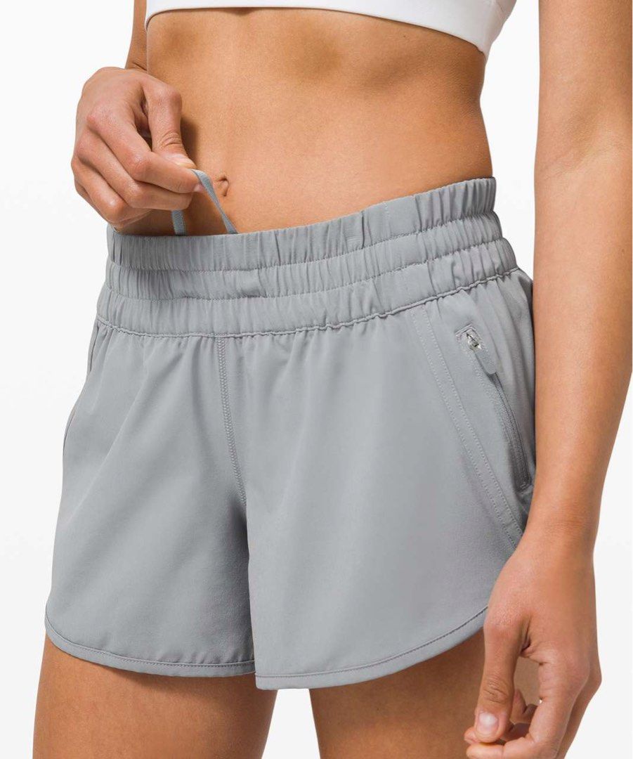 Lululemon Tracker Short 4" - dot 4 (Category: Shorts) located in Pagsanjan. Submitted by zhairaaaaa (Listing ID 1469116798, Image 1). Description: Lululemon athletic shorts in grey. High-rise waistband with internal drawcord to keep everything secure while running or working out. Zippered pocket on the side holds cards or keys safely. Lightweight fabric, breathable mesh panels near the hem. Iconic reflective logo on the back right hip. Actual col